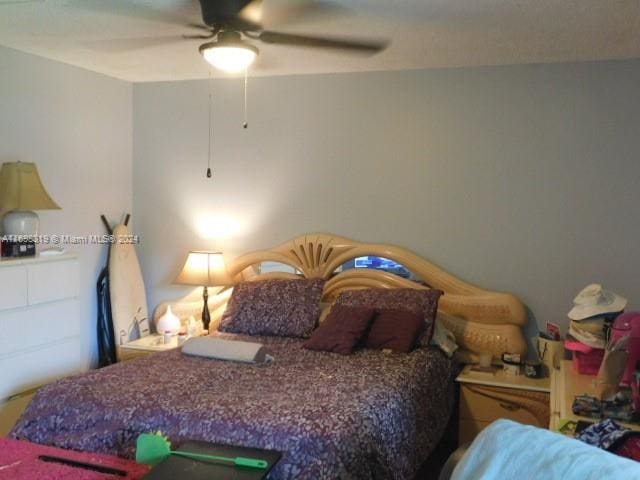 bedroom featuring ceiling fan