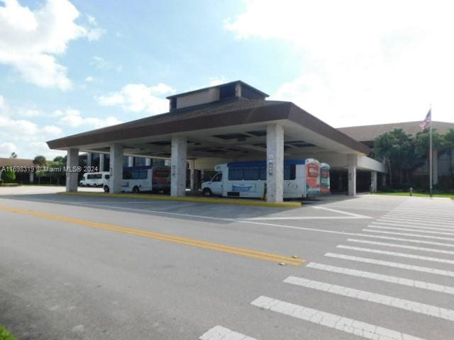 view of car parking featuring a carport