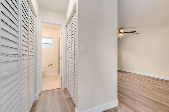 hallway featuring light hardwood / wood-style flooring