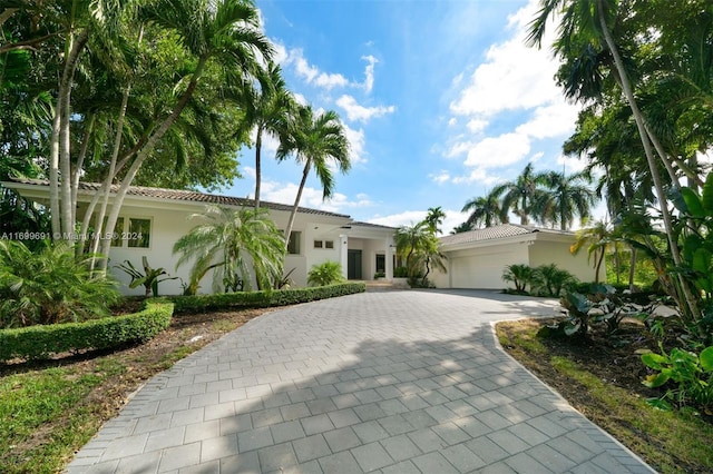 view of front of property with a garage