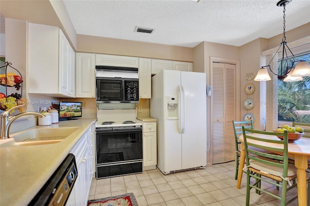 kitchen featuring range with electric cooktop, sink, white fridge with ice dispenser, decorative light fixtures, and white cabinetry