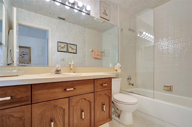 full bathroom with tile patterned flooring, vanity,  shower combination, and toilet