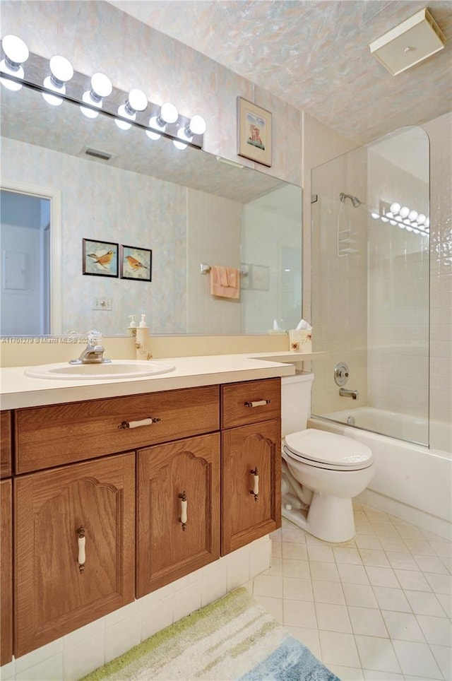 full bathroom featuring toilet, shower / tub combination, vanity, and tile patterned floors