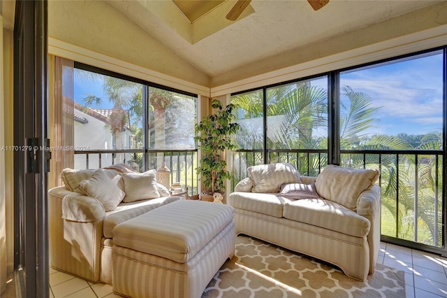 sunroom / solarium featuring ceiling fan and lofted ceiling