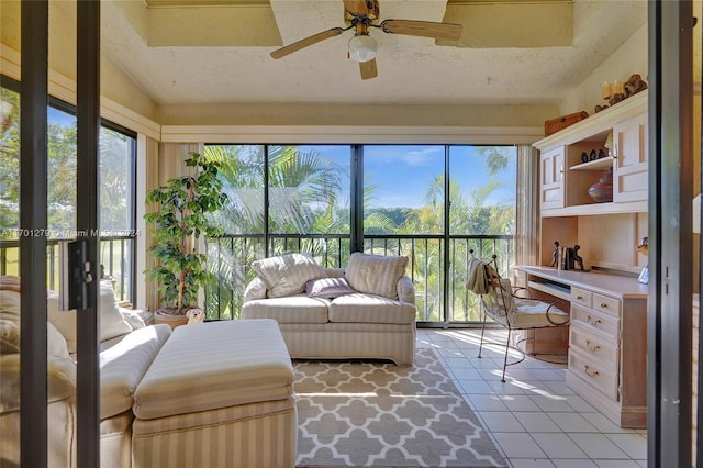 sunroom with ceiling fan and a wealth of natural light