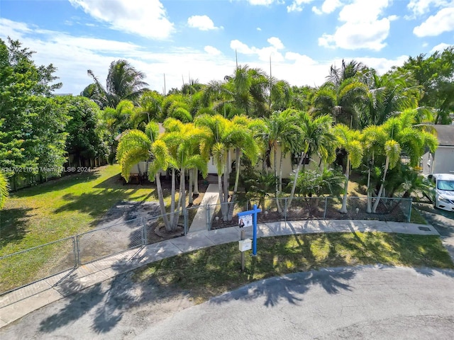 surrounding community featuring a lawn