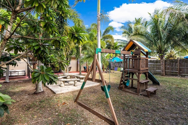 view of jungle gym with a patio area