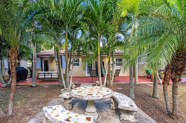 view of front of home featuring a patio