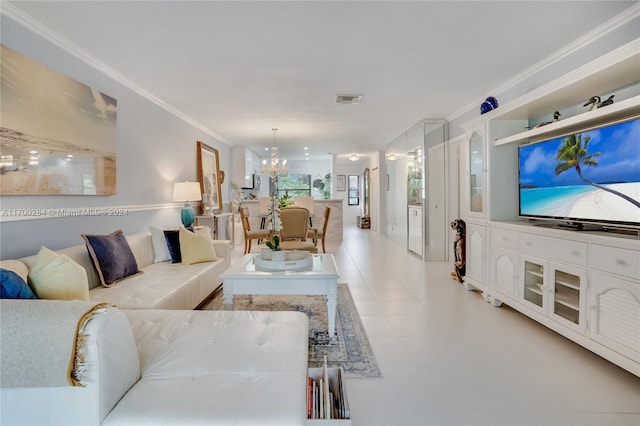 tiled living room with ornamental molding and an inviting chandelier