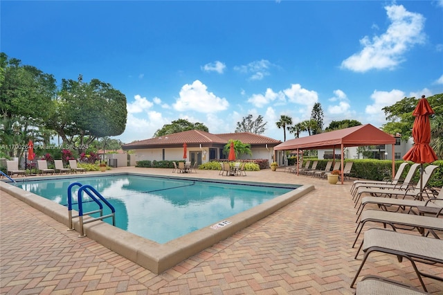 view of pool with a gazebo and a patio area