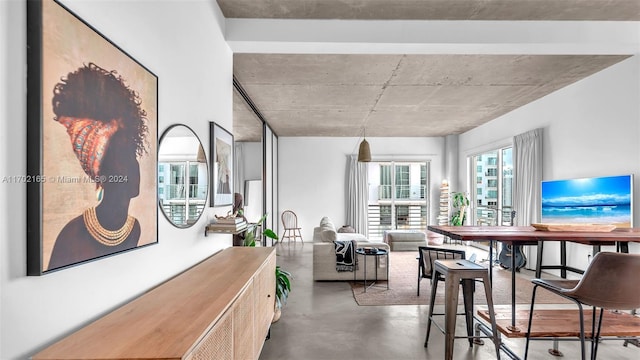 dining space with concrete flooring