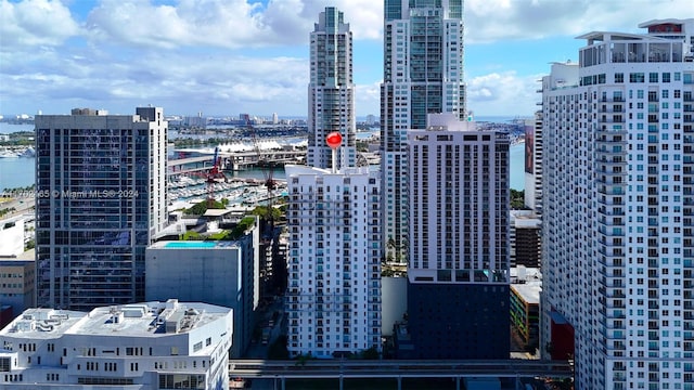 property's view of city featuring a water view