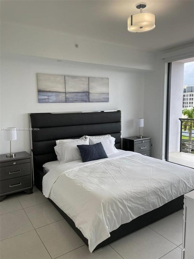 bedroom featuring light tile patterned floors