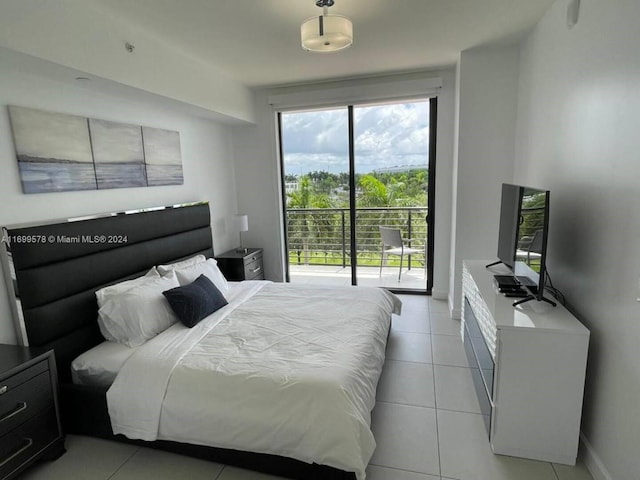 bedroom with access to exterior, multiple windows, and light tile patterned flooring