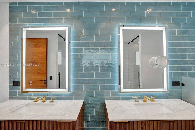 bathroom featuring tasteful backsplash, vanity, and tile walls