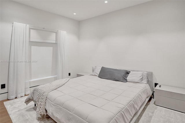 bedroom featuring light hardwood / wood-style floors