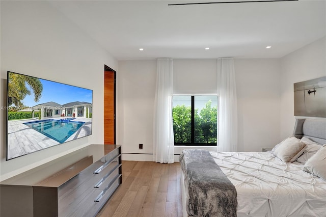 bedroom featuring light wood-type flooring