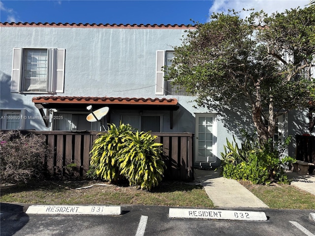 10806 N Kendall Dr Unit P-26, Miami, FL 33176 - view of front of house with uncovered parking and stucco siding