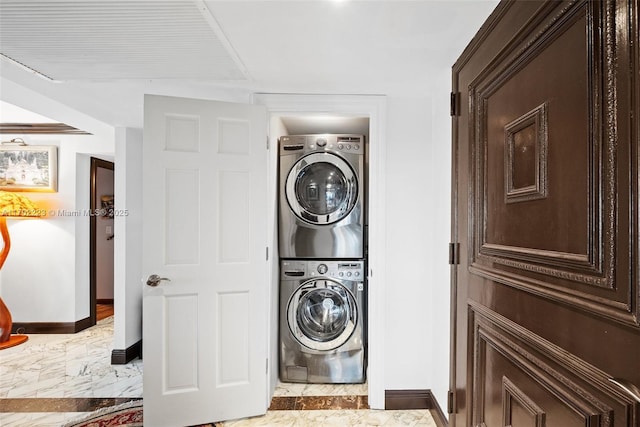 washroom with stacked washer / drying machine