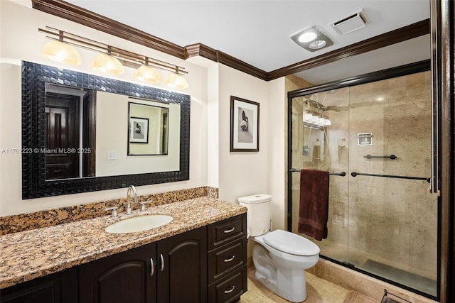 bathroom with toilet, vanity, walk in shower, and ornamental molding