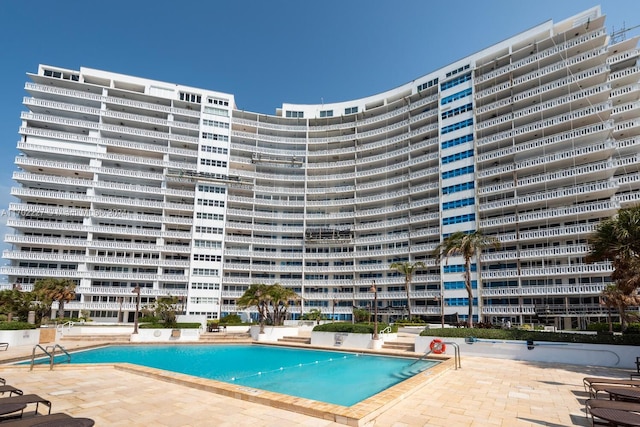 view of pool with a patio area