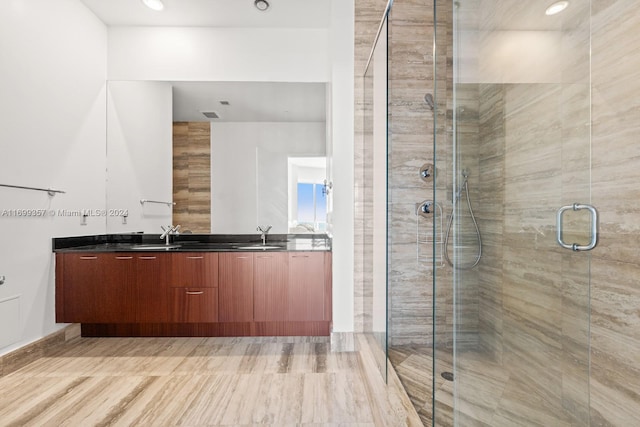 bathroom featuring vanity and walk in shower