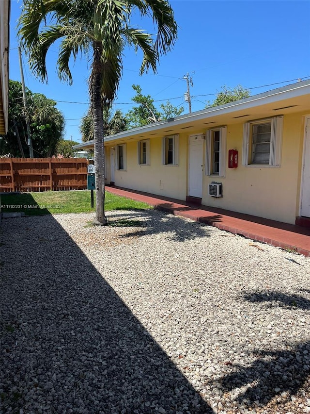 exterior space with an AC wall unit