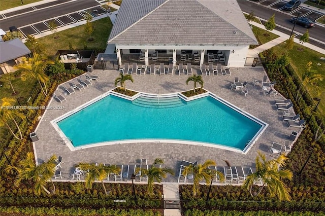 view of swimming pool with a patio