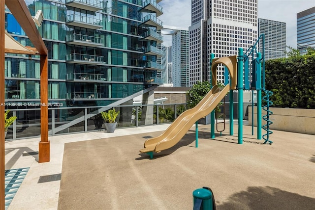 community play area with a city view