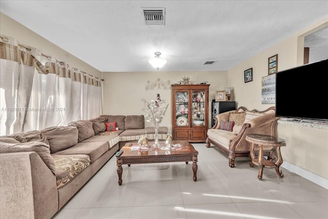 living room featuring tile patterned flooring