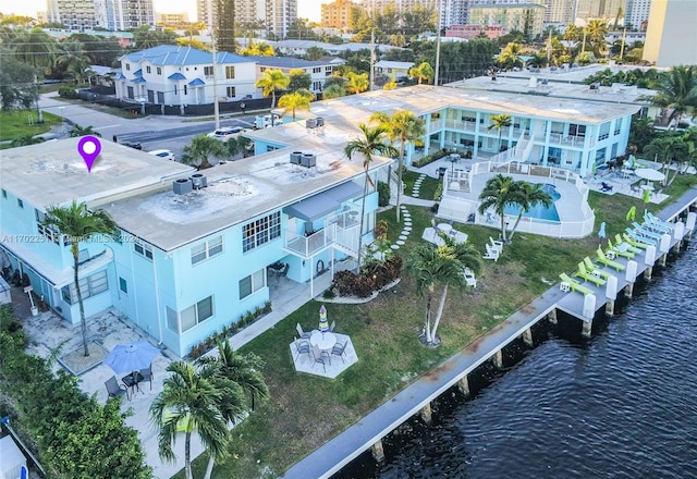 birds eye view of property featuring a water view