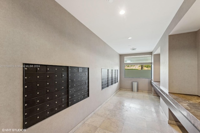 corridor featuring mail boxes