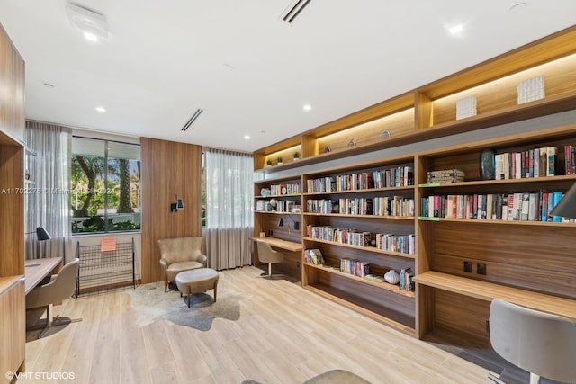 sitting room with light hardwood / wood-style floors