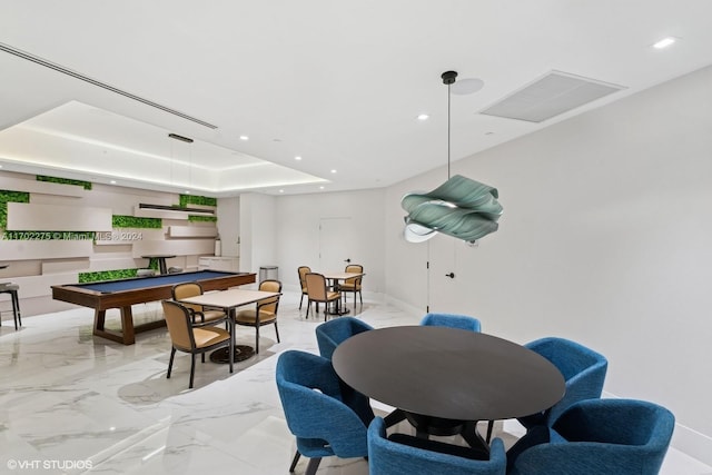 recreation room featuring billiards and a tray ceiling