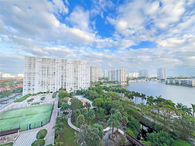 birds eye view of property with a water view