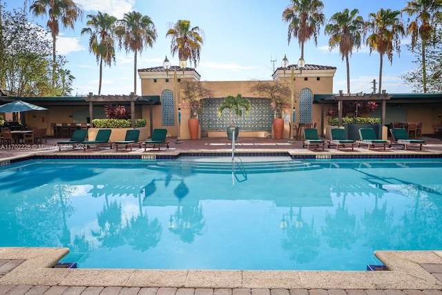 view of pool featuring a patio area