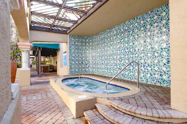 view of pool featuring an indoor in ground hot tub