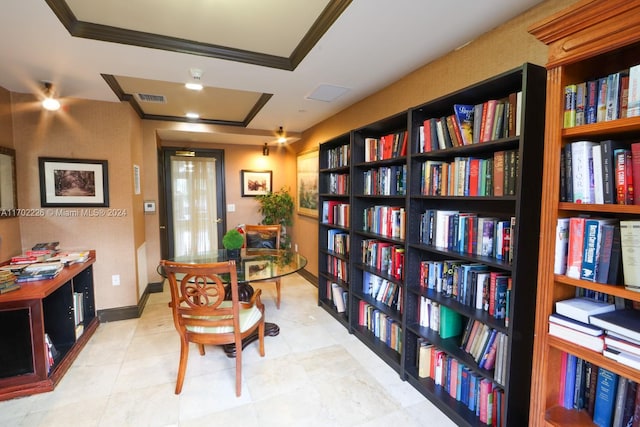 living area featuring crown molding