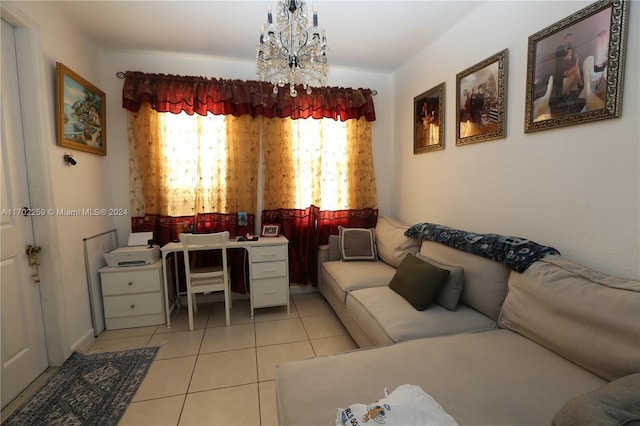 living room featuring a chandelier and light tile patterned flooring