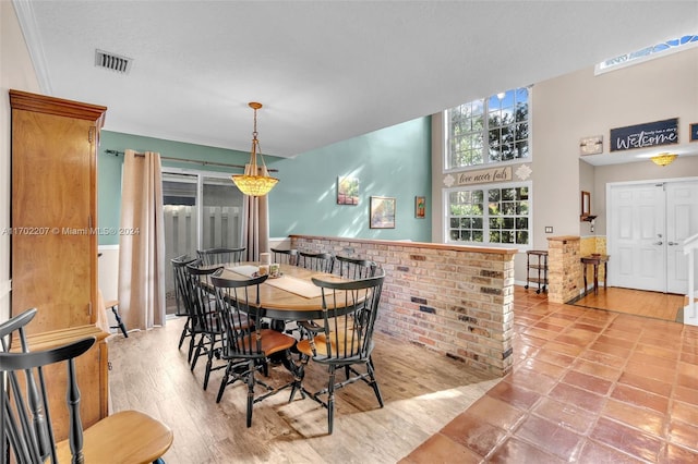 dining area with light hardwood / wood-style floors