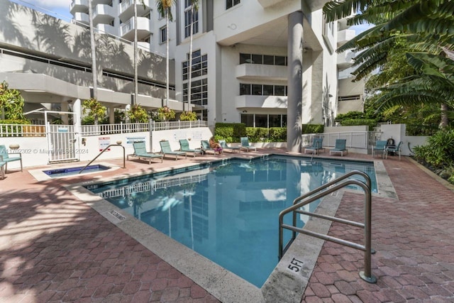 view of pool featuring a patio area