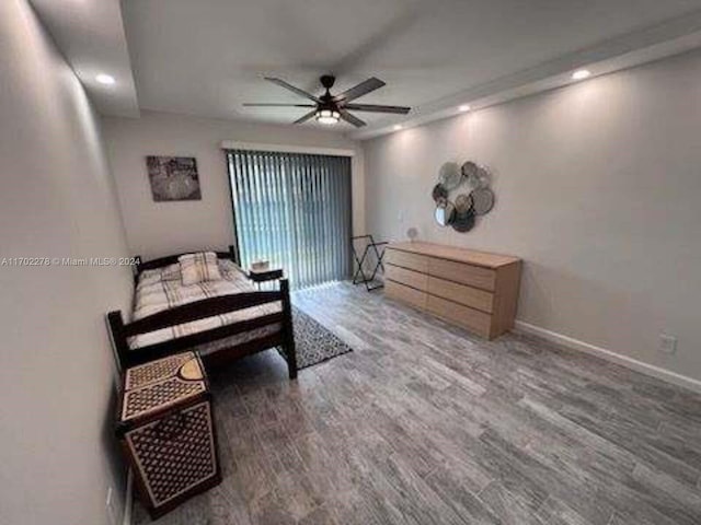 bedroom featuring dark hardwood / wood-style flooring