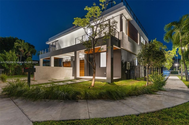 exterior space with a balcony