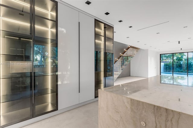 interior space featuring light stone counters