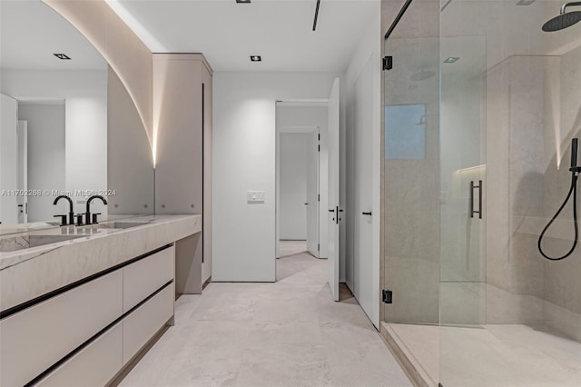 bathroom featuring vanity and walk in shower