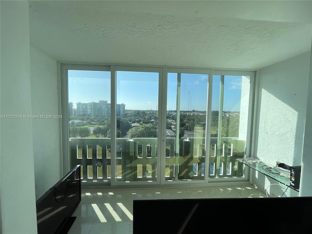 unfurnished sunroom with a healthy amount of sunlight