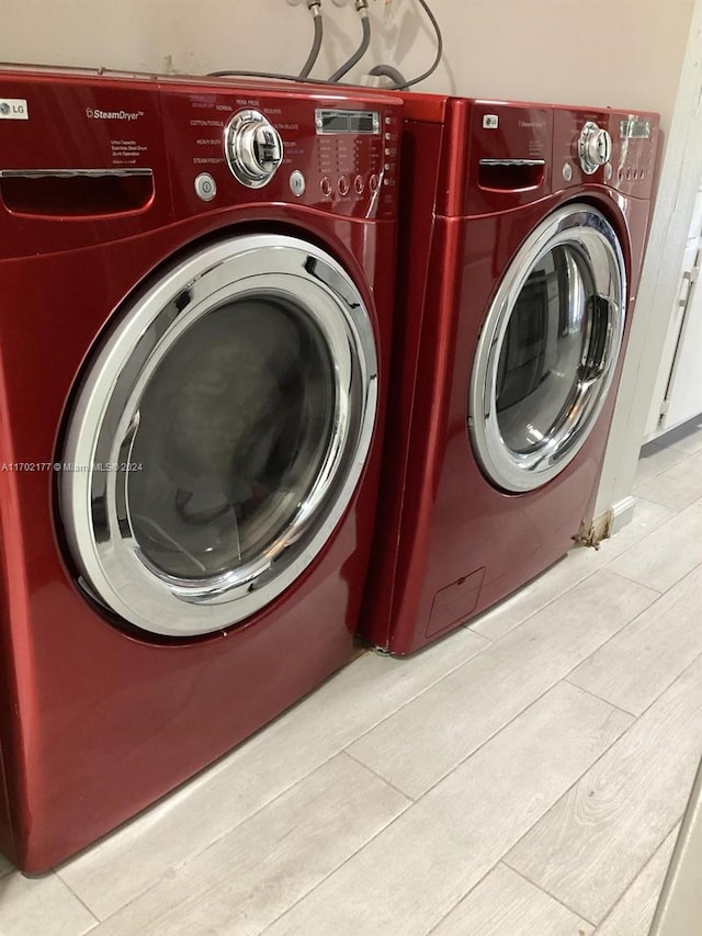 washroom with separate washer and dryer