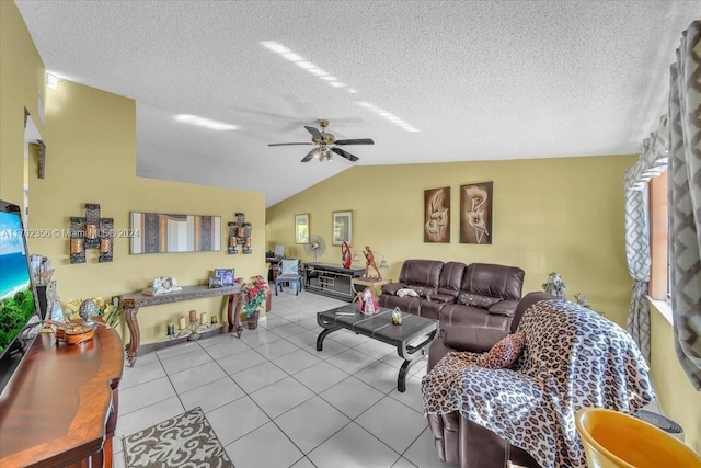 living room featuring light tile patterned floors, a textured ceiling, vaulted ceiling, and ceiling fan