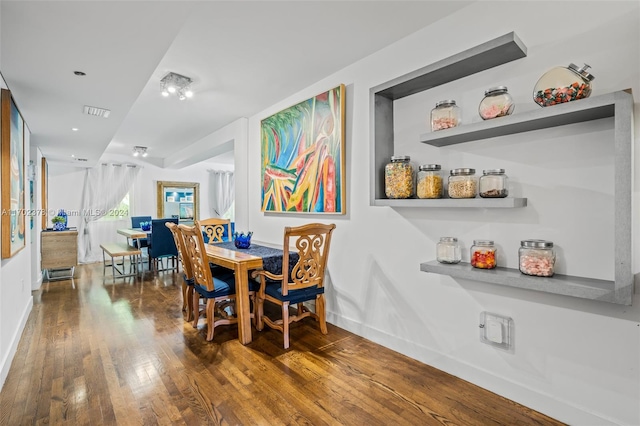 dining room featuring hardwood / wood-style floors