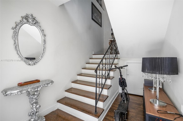 stairway featuring hardwood / wood-style flooring